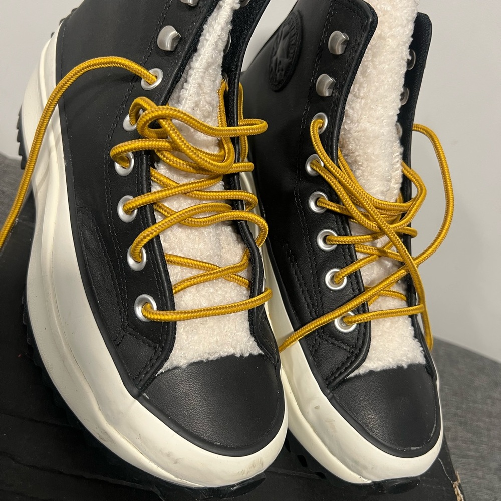 Converse Black High-Tops with Yellow Accents